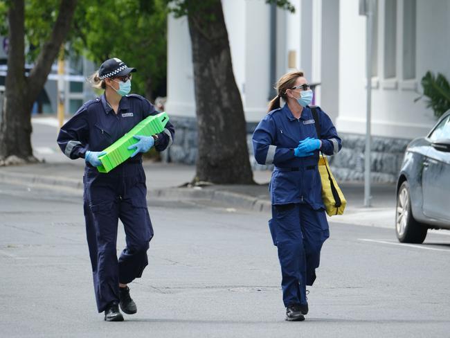 Forensic police on the scene in Lt Malop St. Picture: Mark Wilson