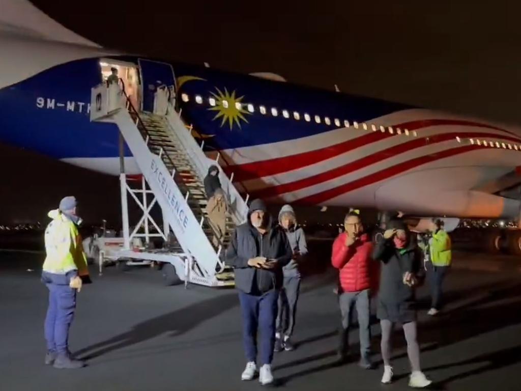 Passengers disembarking MH122 after several hours on the tarmac. Picture: Muhammad Zubair, @chzaib,