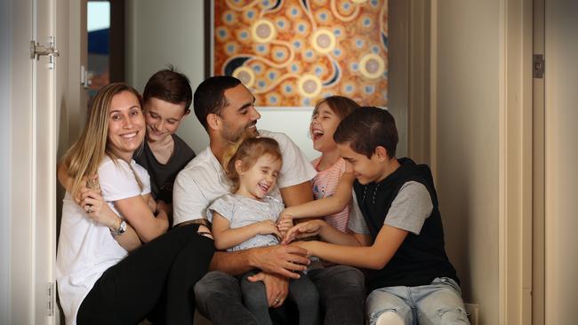 Hawthorn veteran Shaun Burgoyne with his wife and their four kids.