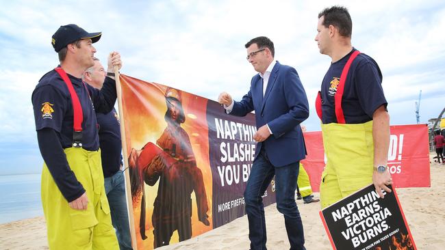 Daniel Andrews with firefighters in 2014. Picture: Nathan Dyer