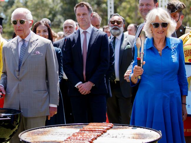 King Charles and Queen Camilla walked through the barbecue with NSW Premier Chris Minns. Picture: NewsWire / Nikki Short