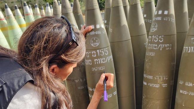 Nikki Haley went to the West Bank settlements and then went to sign on a bomb "finish them". Picture: Twitter.