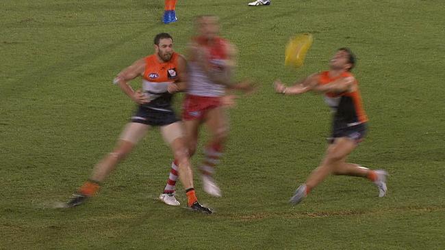 Shane Mumford accidentally helps Lance Franklin to lay a bump on Tim Taranto.