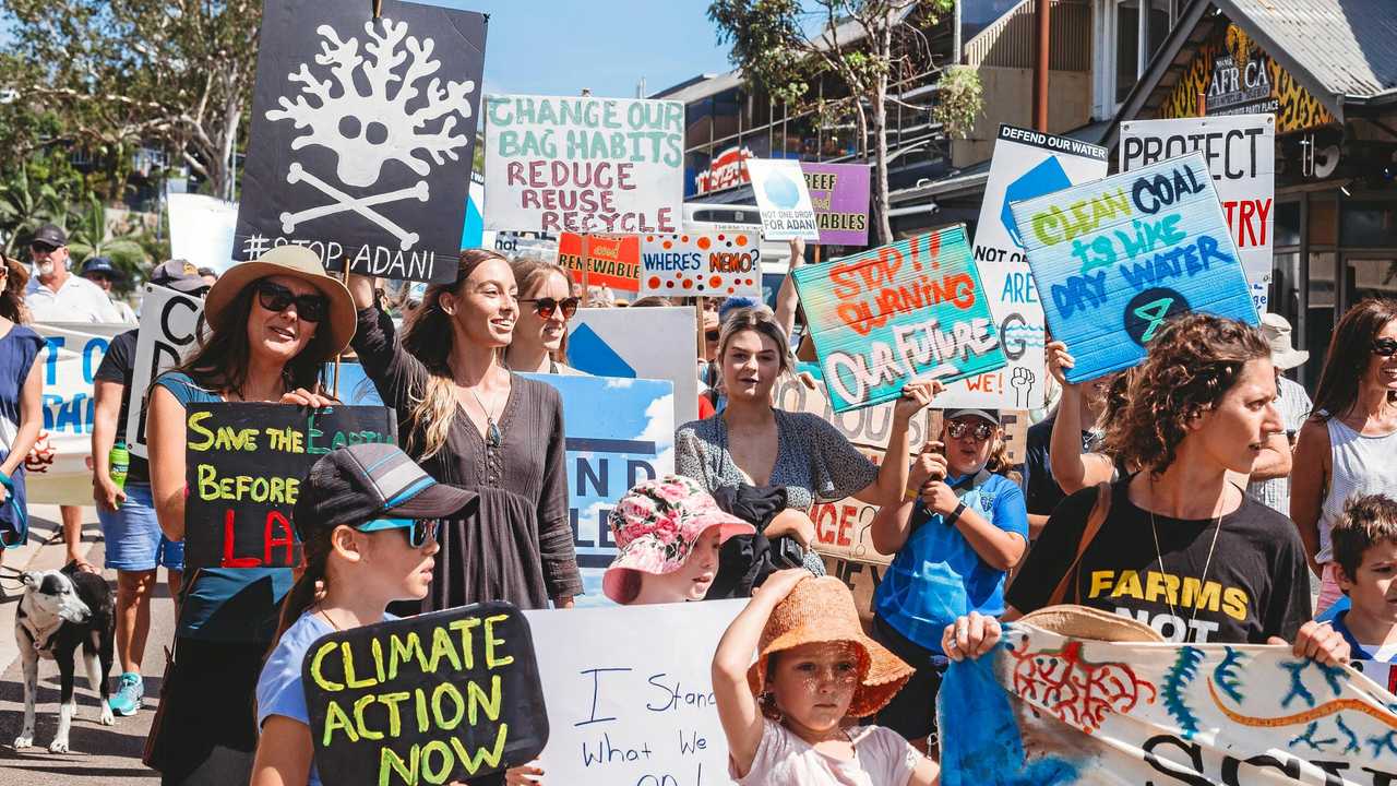 There was no shortage of colourful signs and banners at the Whitsunday Climate Strikes. Picture: Rozie O'Brien