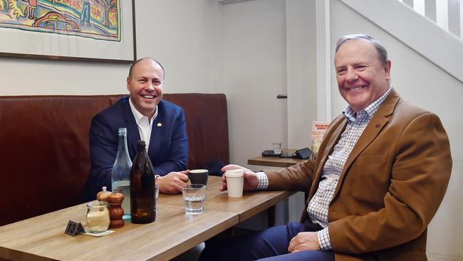 The Future Fund, which is chaired by Peter Costello, pictured right with Treasurer Josh Frydenberg, will wind down its remaining $200m exposure to companies listed on the Russian stock exchange. Picture: Nicki Connolly