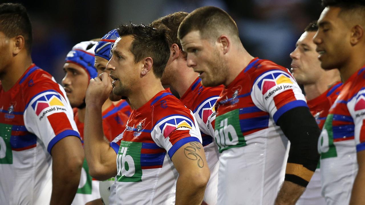 Knights players look on during the Round 23 loss to Wests Tigers.