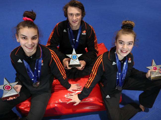 (L-R) Hannah Triantafillis, Bo Danelutti and Annabella Geraghty from Balance Gymnastics in Research won titles at the Gymnastics Victorian Championships.