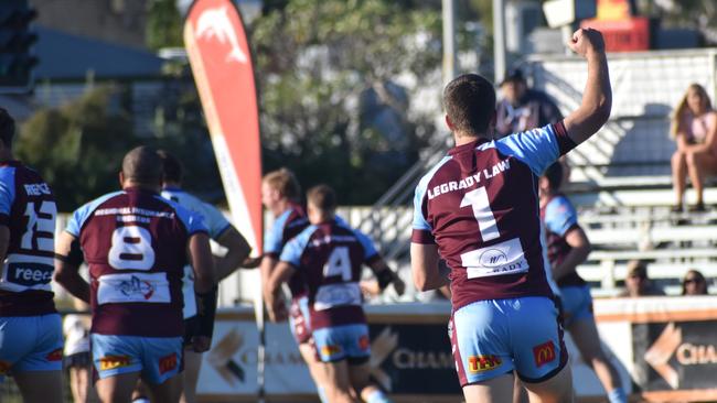 CQ Capras' fullback Blake Moore celebrates teammate Tom Farr's try. Photo: Pam McKay