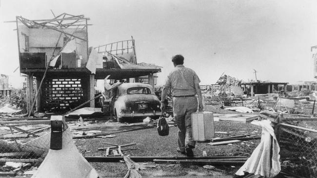 Cyclone Tracy occurred on Christmas Day, 1974 in Darwin. A devastated homeowner returns from holiday to find his home wrecked. Picture Bruce Howard