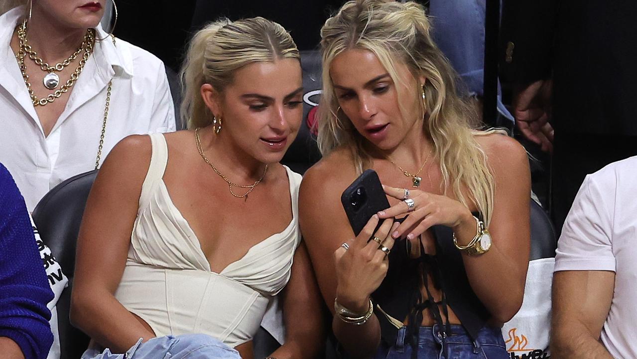 Haley and Hanna Cavinder attend Game Four of the 2023 NBA Finals this month. Photo by Megan Briggs/Getty Images.