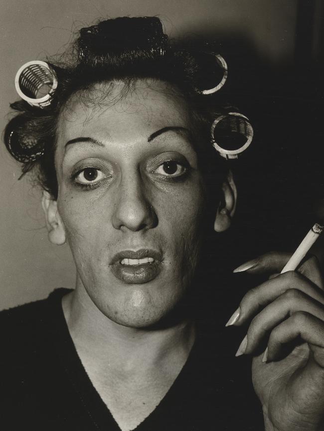 A young man in curlers at home on West 20th St., N.Y.C. 196. Picture: Diane Arbus