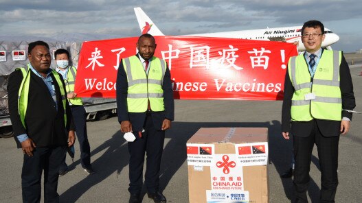 Chinese Ambassador Zeng Fanhua at Port Moresby’s Jacksons International Airport with PNG Planning Minister Rainbo Paita. Picture: Chinese Embassy in PNG