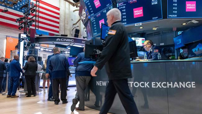 Traders walk on the floor of the New York Stock Exchange. Picture: Getty Images