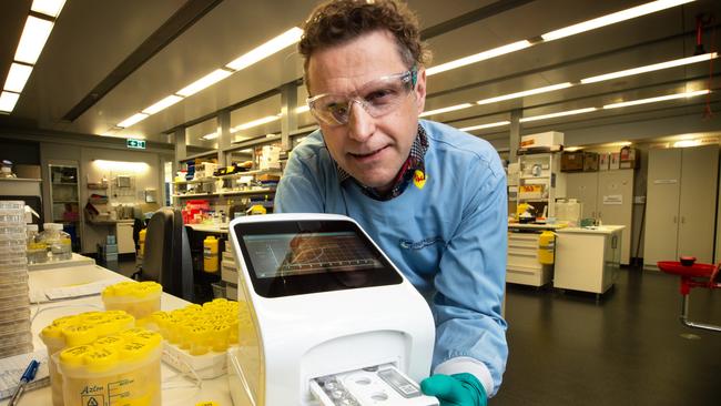 Professor Mark Pellegrini with the C-Find machine. Picture: Tony Gough