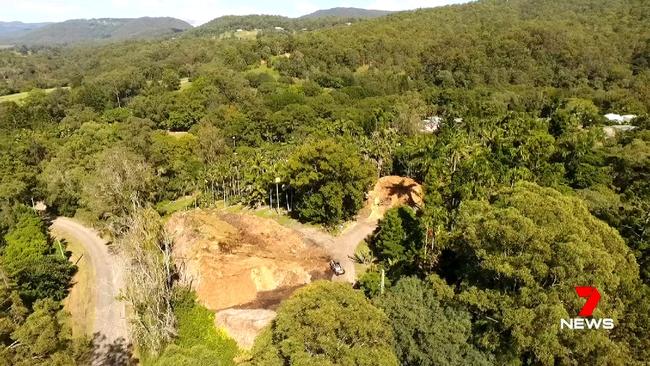 Machinery captured carving out a film location off little Nerang Road for Ron Howard’s Thirteen Lives production. Pictures: Channel 7