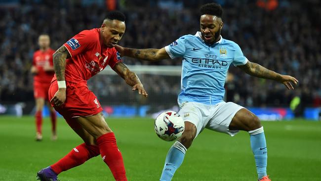 Nathaniel Clyne (L) vies with Raheem Sterling.