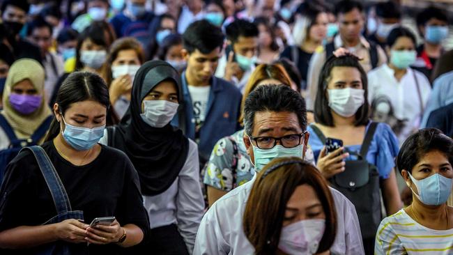 Masks are not recommended unless you are actually sick – washing your hands properly is a much better way to avoid infection. Picture: Mladen Antonov/AFP