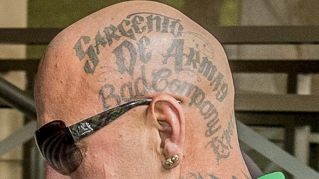 Mitchell may have quit but his former post will stay tattooed on his head.