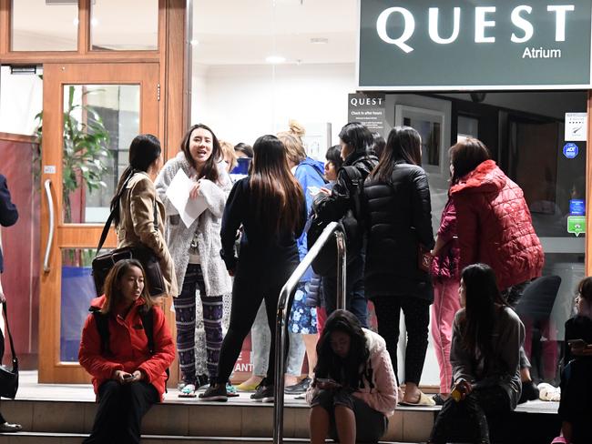 People evacuated from the Quest Hotel on the The Terrace, Wellington after the earthquake based around Cheviot in the South island jolted the capital. Picture: AAP