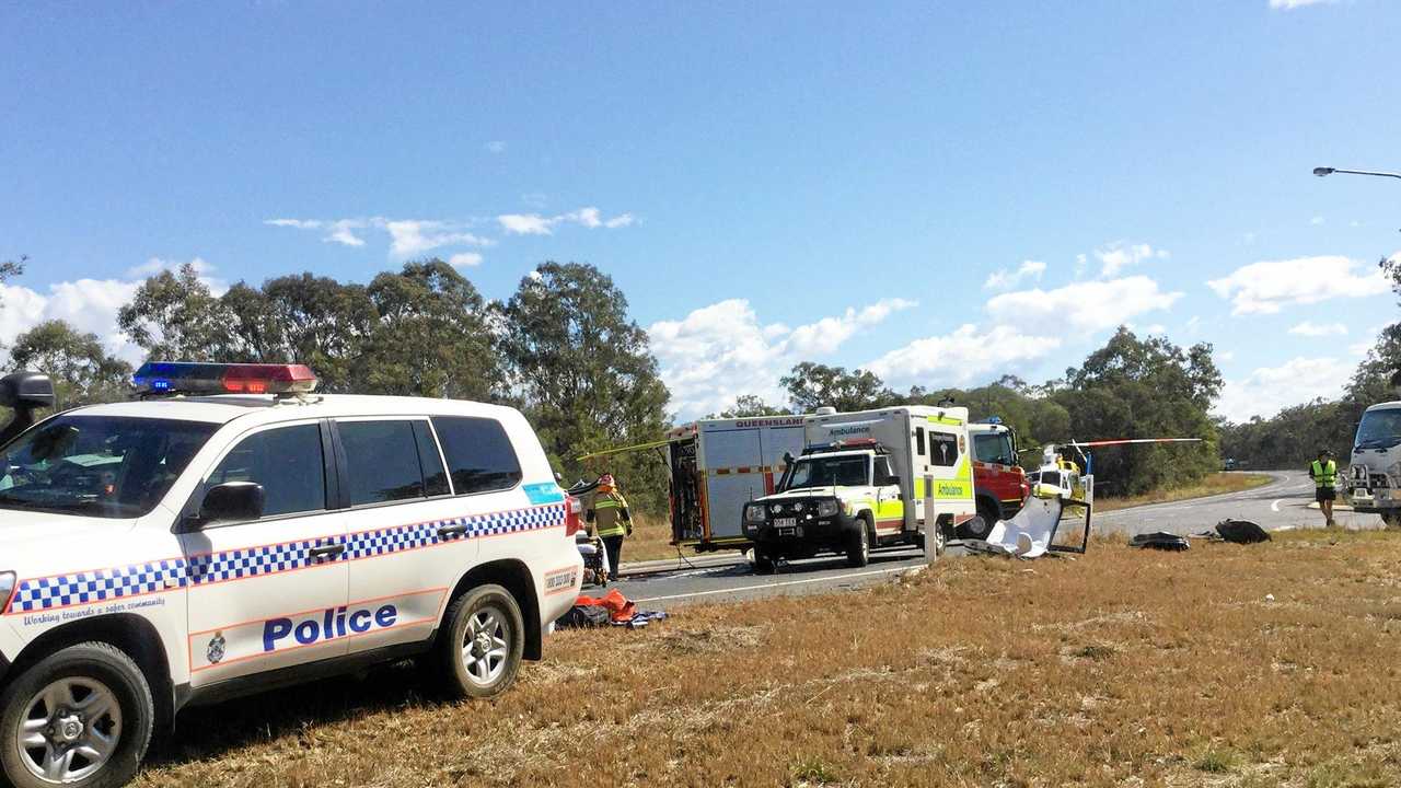 Two trapped after headon crash on Bruce Hwy Herald Sun