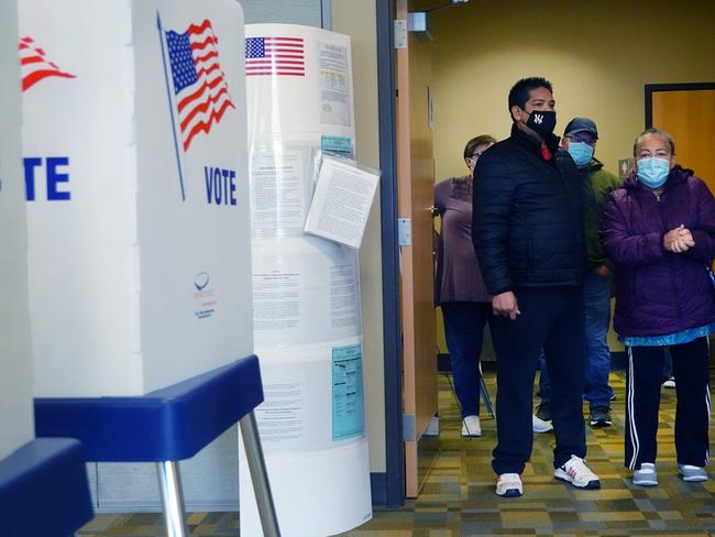 Residents wait in line to vote at the Beloit Public Library in Beloit, Wisconsin. Picture: AFP/Getty Images