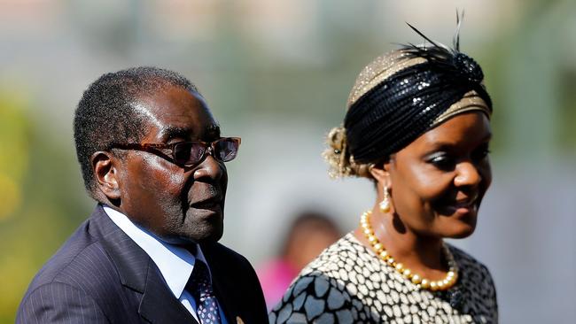 Zimbabwean president Robert Mugabe arriving with his wife Grace for the inauguration ceremony of South African president Jacob Zuma at the Union Buildings in Pretoria. Picture: AFP / Siphiwe Sibeko.