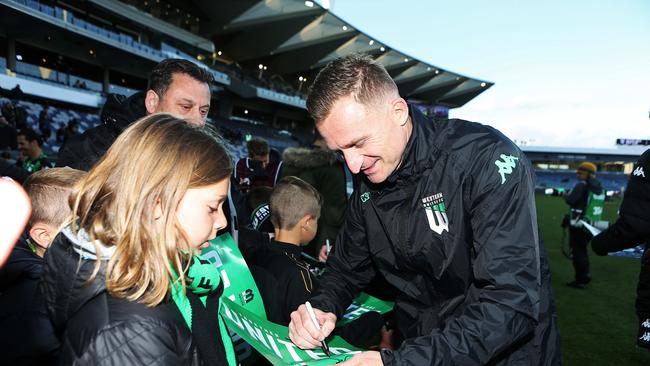 Besart Berisha signs autographs for young fans after Western United's 1-1 draw with Perth Glory. Picture: Getty Images