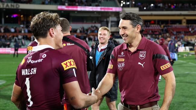 Reece Walsh gets a deserved handshake from Maroons coach Billy Slater. (Photo by Cameron Spencer/Getty Images)