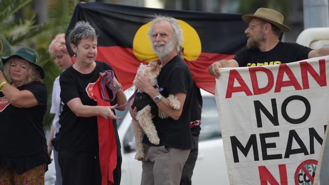 Ant-Adani activists outside the leaders forum in Townsville. Picture: AAP Image/Tracey Nearmy