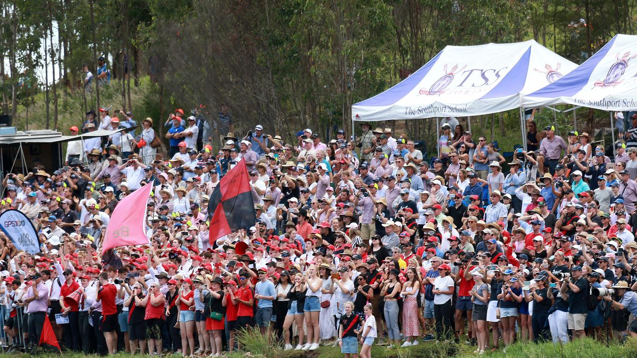 Crowds cheer home the Open Eight division 1 race at the GPS Head of the River, Lake Wyaralong. Picture: Sarah Marshall/AAP