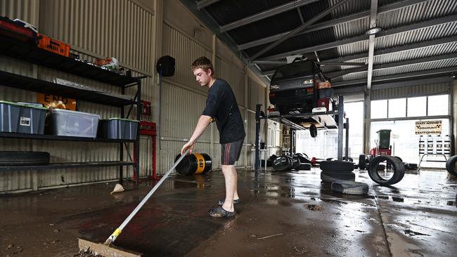 Dominic Porter from Hassard Industries in the aftermath from flooding caused by ex-Tropical Cyclone Alfred in Bundamba, on Tuesday. Picture: Tara Croser.