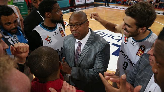 Joey Wright speaks to his players after they beat Perth on the road on Sunday.