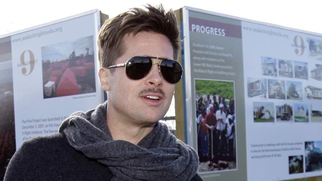 Brad Pitt in the Lower 9th Ward, New Orleans, where homes were built by his Make It Right Foundation, now facing a lawsuit over homes that have fallen into decay. Picture: AP Photo/Alex Brandon