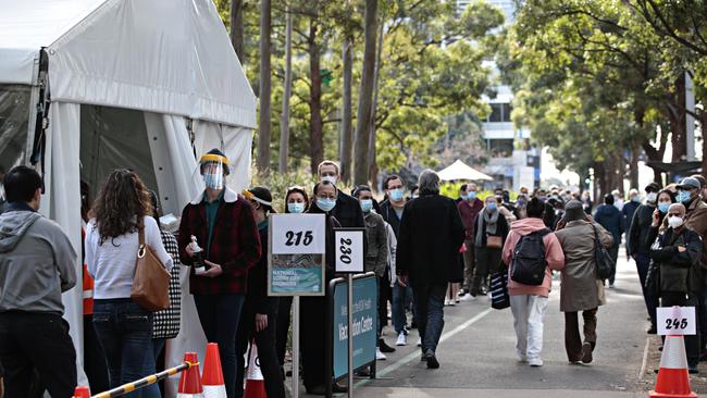 People line up at the Vaccination Hub at Sydney Olympic Park. Picture: NCA NewsWire / Adam Yip.