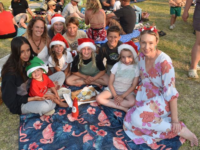 Prue, Koah, Ashton Chudiak, Sapphire, Mason, Sonny, Maya, Jarrah, Ashleigh, Deb Leonard (Independent candidate for Monash) at the San Remo Christmas Carols at the foreshore on Friday, December 20, 2024. Picture: Jack Colantuono