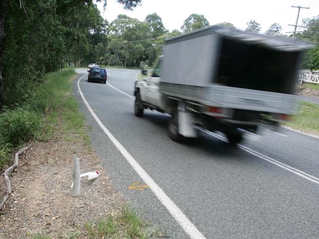 A car crashed on Springbrook Road, Mudgeeraba . Photo taken at the scene.