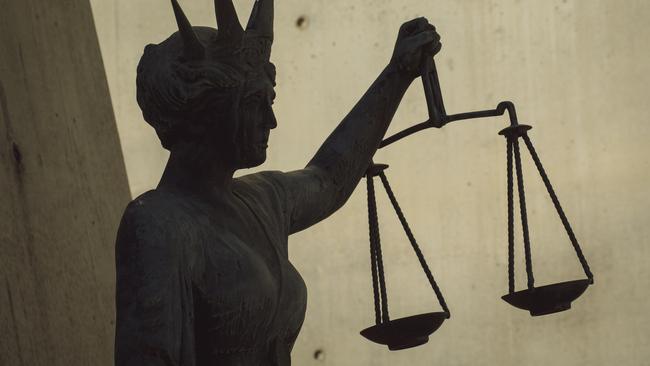 BRISBANE , AUSTRALIA - NewsWire Photos - BRISBANE , JUNE 24 2024: Generic photo of the scales of justice stature outside Brisbane Supreme Court in the Brisbane CBD. Picture: NewsWire / Glenn Campbell