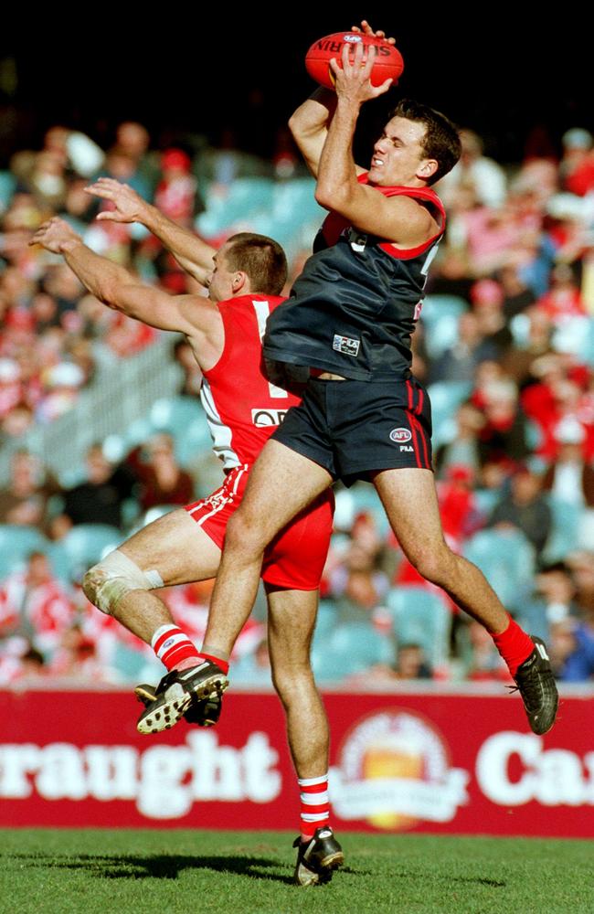 Matthew Whelan takes a strong mark over Paul Kelly at the MCG in 2000. Picture: Michael Klein