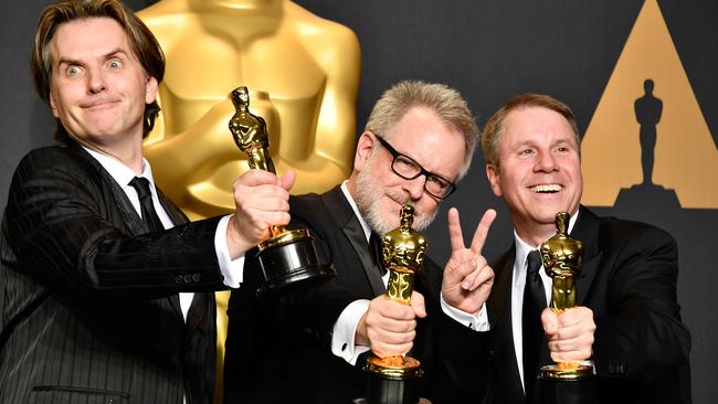 Co-directors Byron Howard and Rich Moore and producer Clark Spencer. Picture: Getty