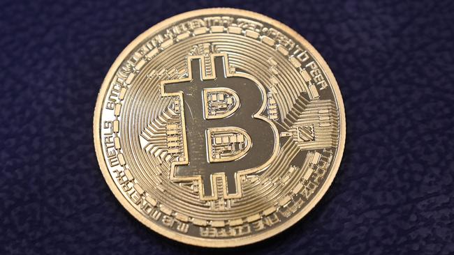 Physical imitations of bitcoin give us an image of something that exists solely in the cloud. Picture: Ozan Kose/AFP