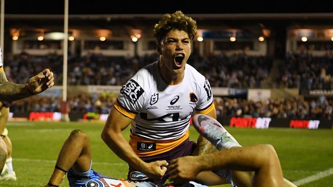 Broncos defenders stop Sharks winger Ronaldo Mulitalo from scoring. Picture: NRL Photos