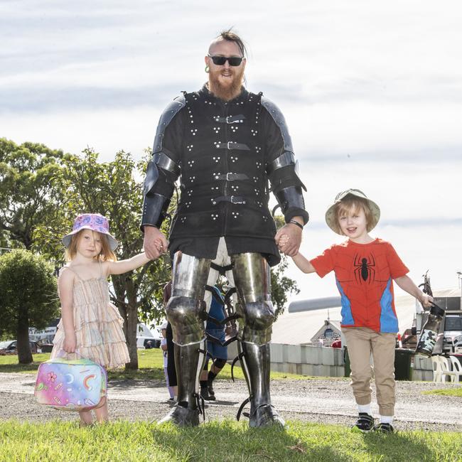 Amelia 3yo and Luc 5yo with their dad Derek McAuley, a member of Tyr's Warriors. Toowoomba Royal Show. Friday, March 31, 2023. Picture: Nev Madsen.