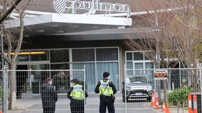 Police stand guard outside the Pullman medi-hotel in Adelaide during a lockdown. Picture: NCA NewsWire / David Mariuz