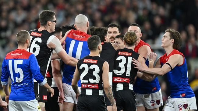 Players from both sides scuffle after the incident. Picture: Quinn Rooney/Getty Images.