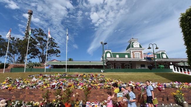 Flowers are laid outside Dreamworld. Picture: AAP