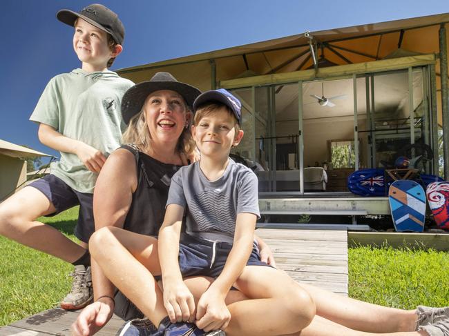 Belinda McDonnell from Eumundi with sons Hudson 9, and Noah 7 at a Glamping tent at Habitat Noosa Campground at Lake Cootharaba.  Photo Lachie Millard