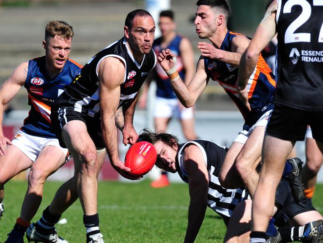 Moonee Valley’s Cory McGrath fires off a handball on Saturday. Picture: Jamie Morey