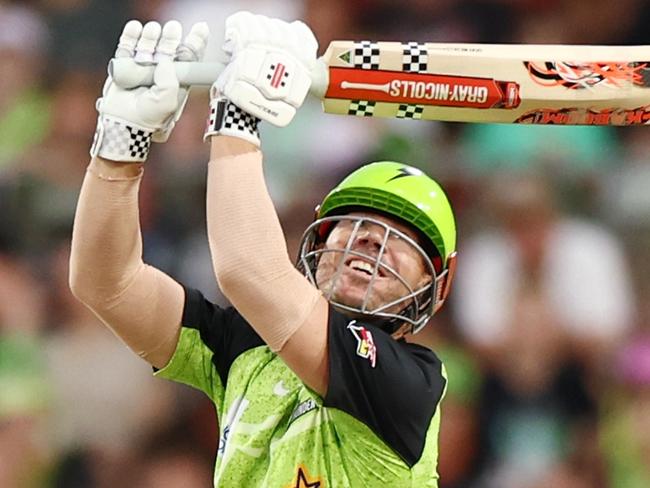 SYDNEY, AUSTRALIA - JANUARY 13: David Warner of the Thunder bats during the BBL match between Sydney Thunder and Perth Scorchers at ENGIE Stadium, on January 13, 2025, in Sydney, Australia. (Photo by Jeremy Ng/Getty Images)