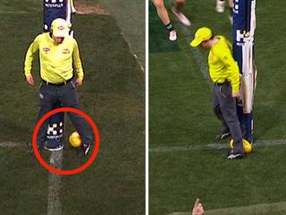 The goal umpire couldn't quite get his dancing feet out of the way.