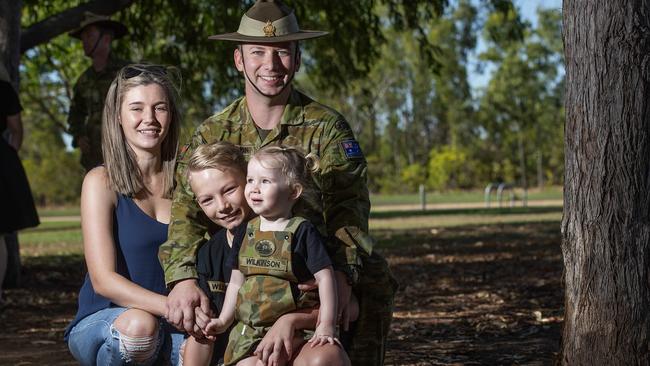 James Wilkinson, wife Caitlin and kids Charlotte, 2, and Christian, 10, ahead of a deployment into the Middle East Region on Thursday, August 1, 2019. Picture: KERI MEGELUS